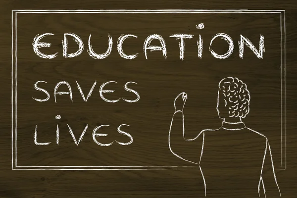 Teacher writing on blakboard: education saves lives — ストック写真