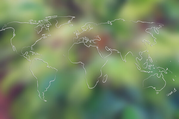 map of the world on blurre tree background