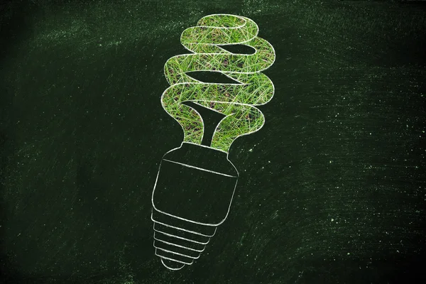 Energy saving bulb made of grass — Stock Photo, Image