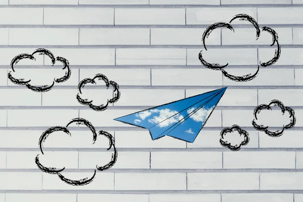 Paper airplane with sky fill and clouds — Stock Photo, Image