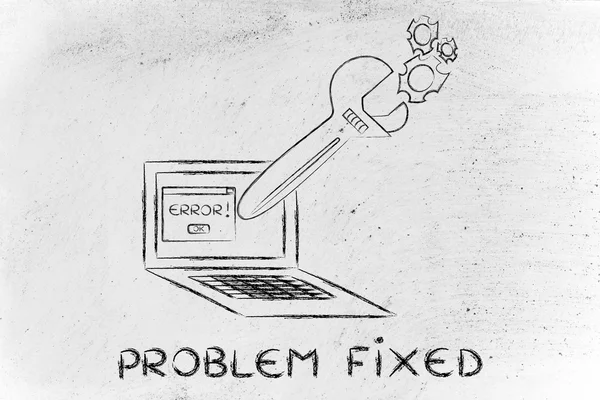 Oversized wrench repairing error message on computer — Zdjęcie stockowe