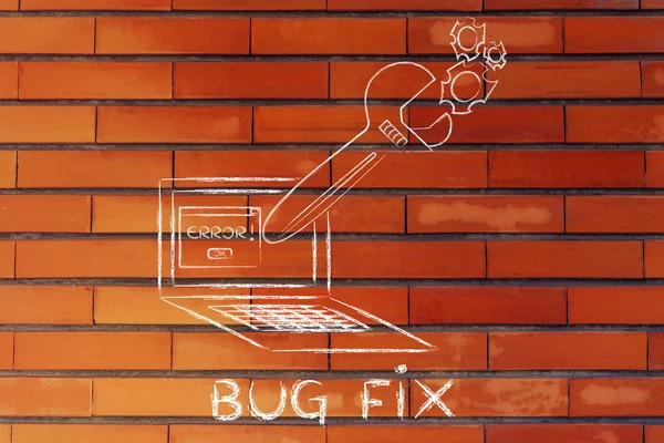 Oversized wrench fixing bugs on a computer — Φωτογραφία Αρχείου