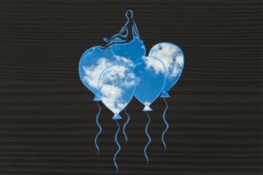 Balon üzerinde oturan kişi mecaz duygu