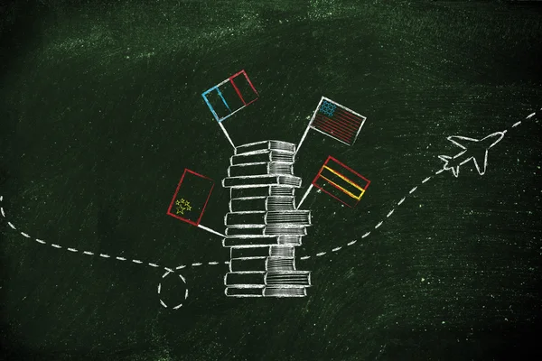 flags and books on a chalkboard