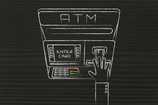 Automatic teller machine with hand inserting credit card — 图库照片