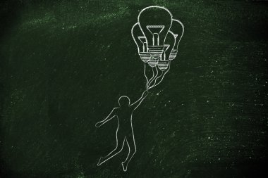 ampul şeklinde balon tutan kişi