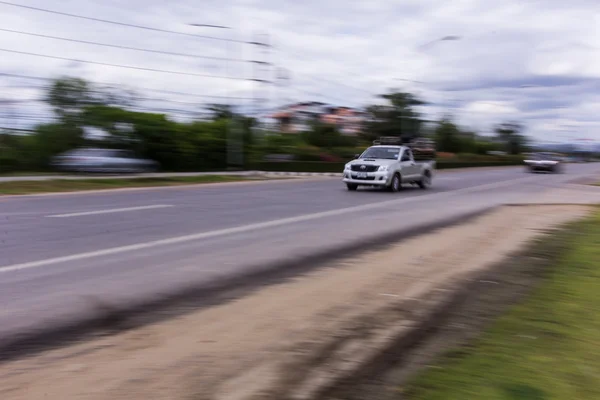 White pick-up Speeding in road — Stock Photo, Image