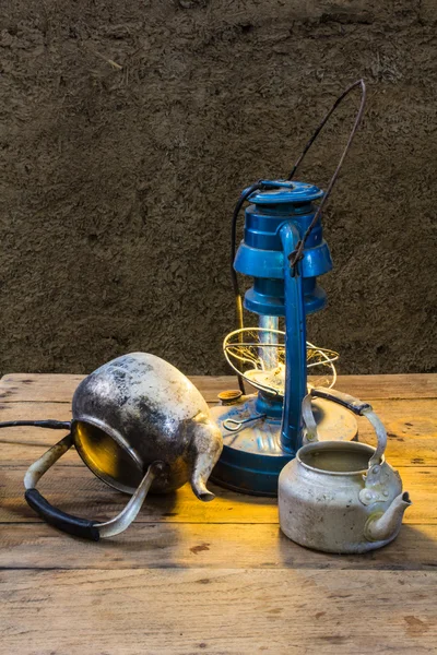 Still life old lamp with old classic kettle — Stok fotoğraf