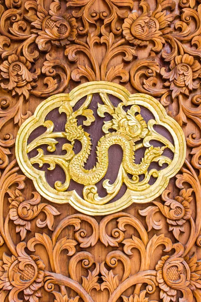 Naga wood Carving Wall sculptures in thai temple — Stock Photo, Image