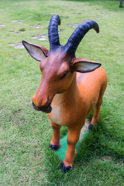 Goat Statue in lawn — Stock Photo, Image