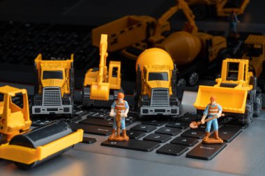 Çevrimiçi inşaatçılar için inşaat araçları ve insan yapımı modeli.