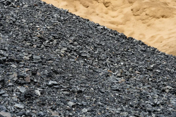 Gravel used to make concrete , to mix with asphalt , to create gravel road or gravel path , to create gravel floor and gravel graden. We bring them together in a gravel pine. gravel texture , gravel background and gravel isolated.