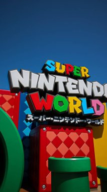 OSAKA, JAPAN - Apr 11, 2021 : Scenery at the entrance of Nintendo World.Super Nintendo World is a themed area at Universal Studios Japan. clipart