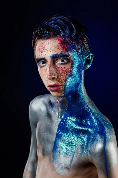 Crazy young androgyne man with face art. SPACEMAN. Freak person. — Zdjęcie stockowe