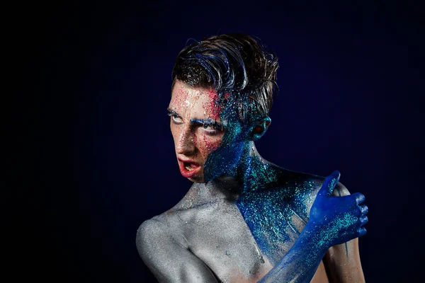 Crazy young androgyne man with face art. SPACEMAN. Freak person. — Stock fotografie