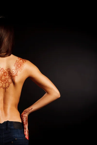 Naked back of young girl with henna tattoo mehendi — Stock Photo, Image