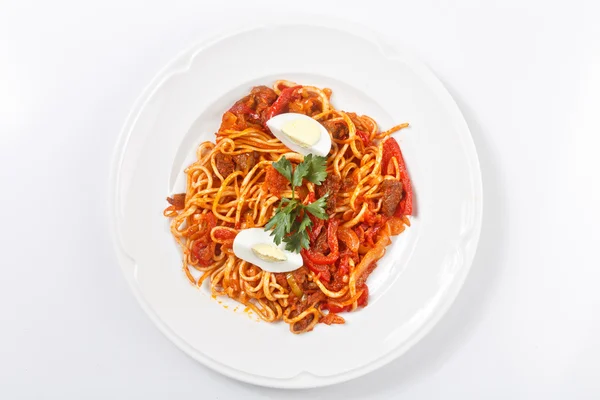 Traditional uzbek lagman meal on white plate isolated — Stock Image Traditional uzbek lagman meal on white plate isolated Royalty Free Stock Photos
