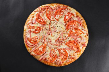 hot tasty delicious rustic homemade american pizza with tomato s