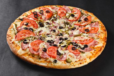 hot tasty delicious rustic homemade american pizza with tomato g