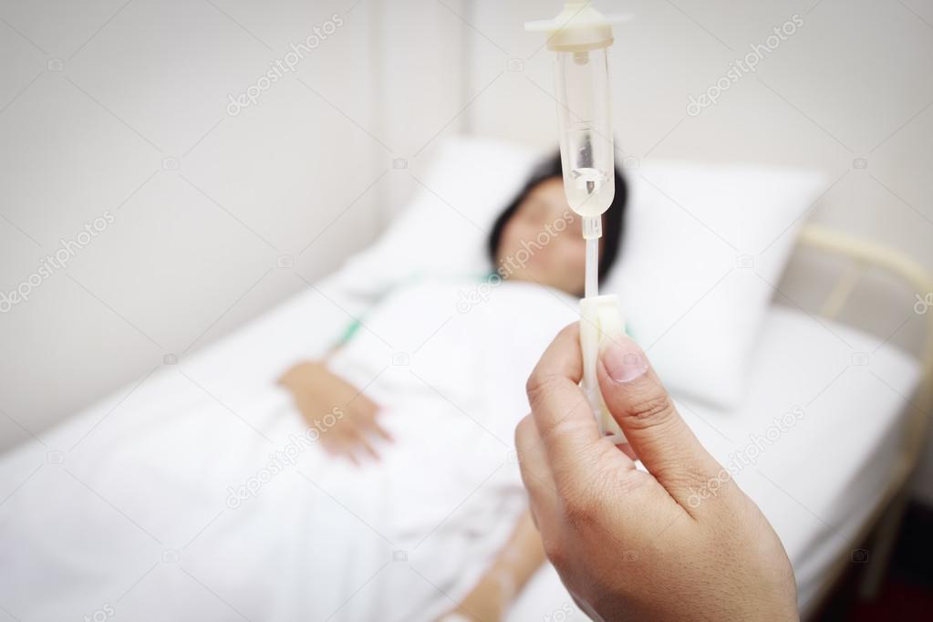 woman patient in hospital with saline 