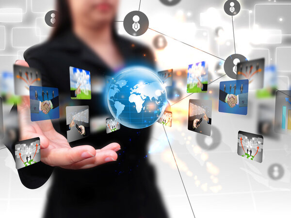 business woman holding business world 