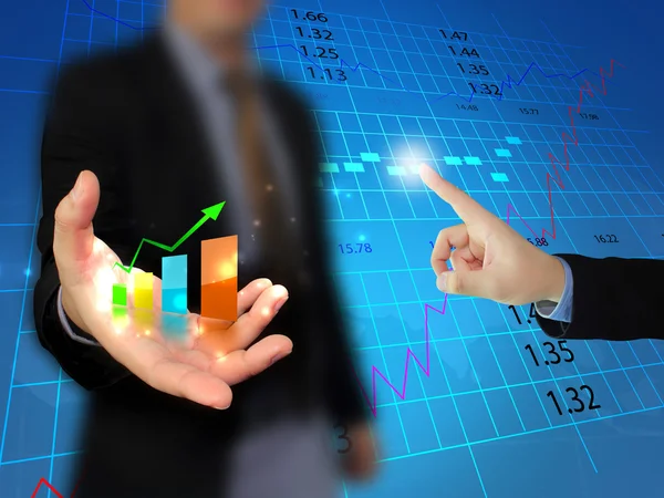 Businessman holding graph — Stock Photo, Image