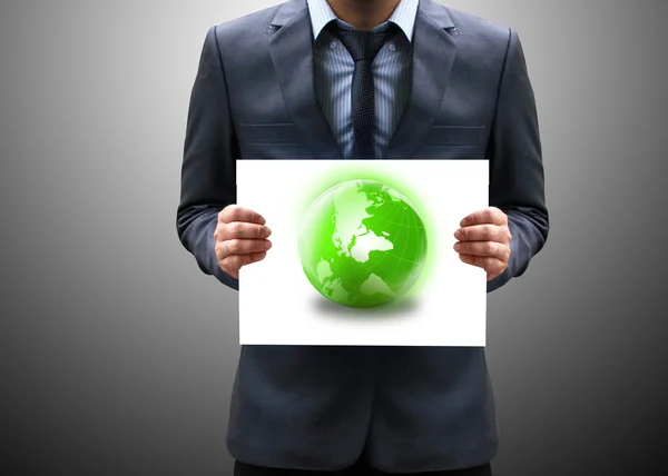 Businessman holding globe — Stock Photo, Image