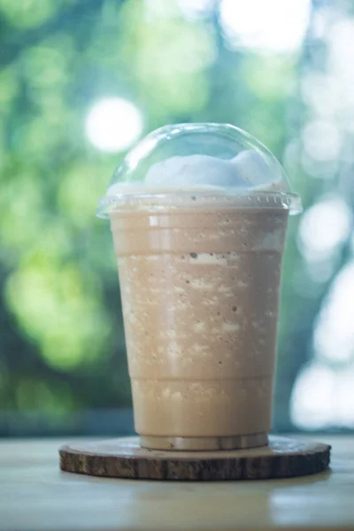 Coffee smoothie in in plastic cup. Coffee time