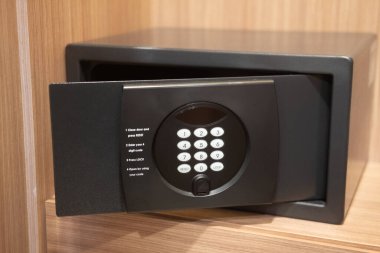 Black safe box in a hotel room closet
