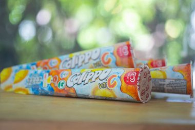 Samut Prakan, Thailand - June 25, 2021 : Ice cream walls calippo with Honey Lemon flavor. New Walls Calippo with Vitamin C. Walls Calippo in Thailand now comes with a vitamin-fortified version