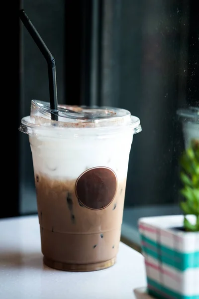 Ice Mocha coffee in take away glass with empty label for your insert logo.