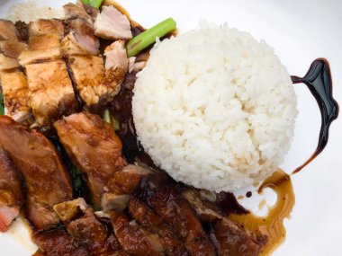 Kızarmış ördek ve pirinçli domuz rostosu