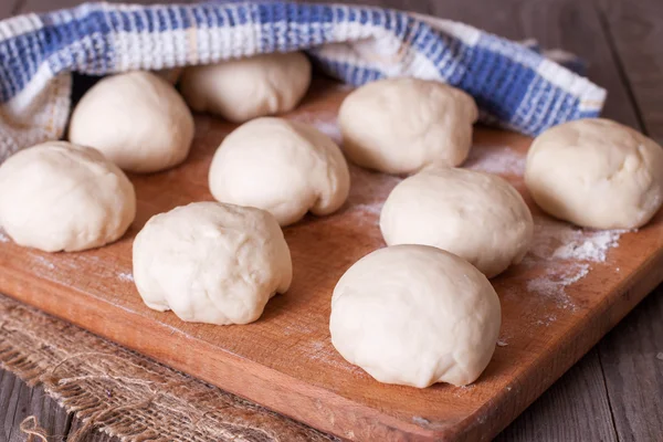 Small balls of fresh homemade dough — Stock Photo, Image