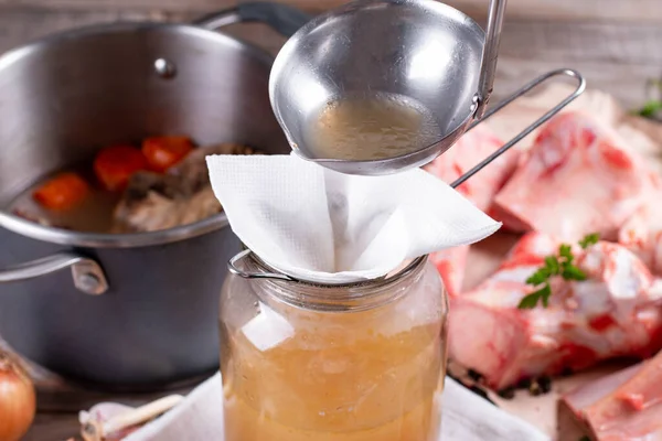 Passing Bone Broth Sieve Paper Napkin Concentrated Bone Broth Glass Stock Image