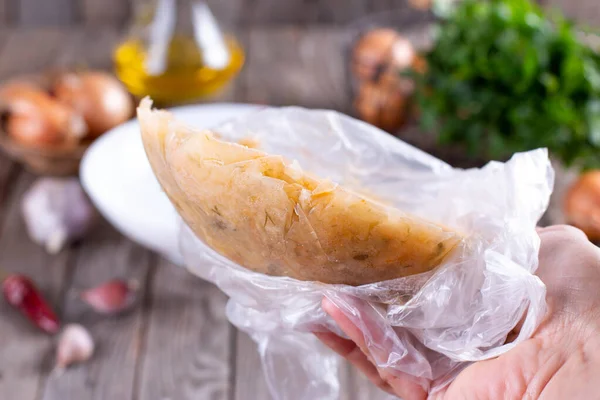 Frozen soup in a plastic bag on a wooden background. Frozen food, healthy food — Stock Image Frozen Soup Plastic Bag Wooden Background Frozen Food Healthy Food Royalty Free Stock Images