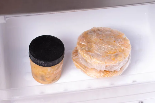A freezer packed homemade soup is shown. Frozen soup. Frozen food — Stock Image Freezer Packed Homemade Soup Shown Frozen Soup Frozen Food Royalty Free Stock Photos