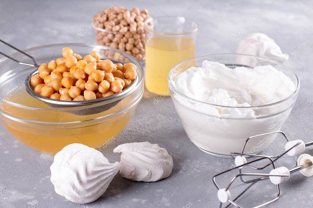 Vegan meringue, boiled chickpea and aquafaba. Egg replacement for vegan recipe. Healthy product.
