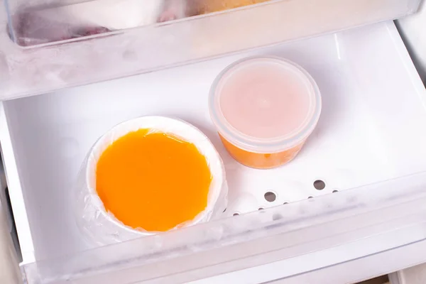 Frozen pumpkin soup. Frozen food. Frozen soup. Preparing food for the week — Stock Image Frozen Pumpkin Soup Frozen Food Frozen Soup Preparing Food Week Stock Picture