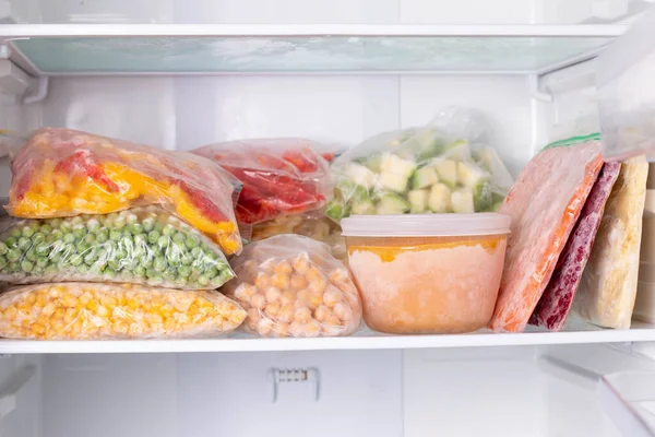 Frozen food in the freezer. Frozen vegetabl Frozen Food Freezer Frozen Vegetables Soup Ready Meals Freezer Stock Photo
