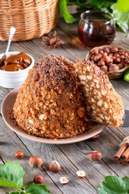 Piece of Sweet Cake with Chocolate, Condensed Milk and Cookies. Anthill cake. Christmas Theme.