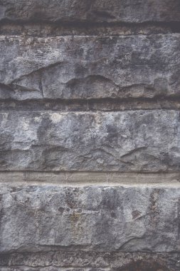 Arkaplan dokusu olarak bir taş duvarı kapat