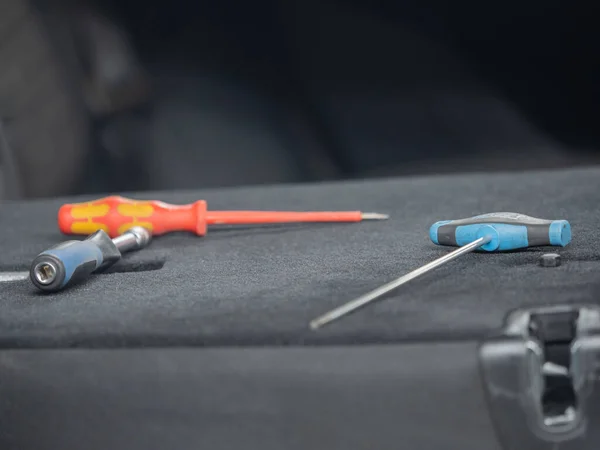 Repairing dents in a car