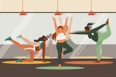 Spor salonunda yoga yapan, antrenman yapan ve eğitmenle meditasyon yapan insanlar.