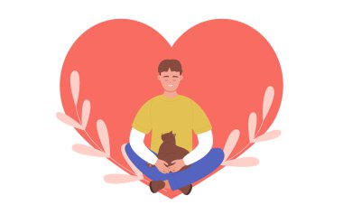 Genç, mutlu adam ve kedi arkadaş, oturan, gülümseyen, kırmızı kalbin içinde evcil kedi yavrusu kucaklayan adam.