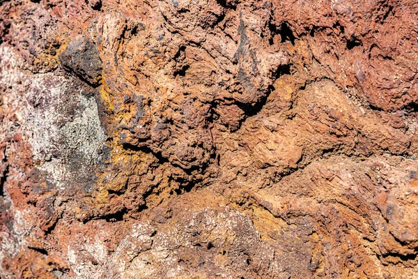 Vulkanikus olvadt szikla dombormű szerkezet láva háttér textúra. — Stock Fotó