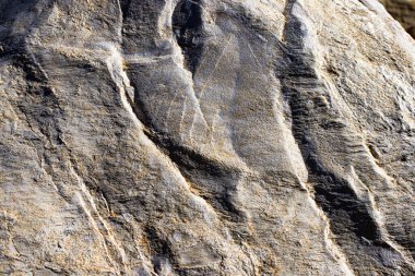 Real natural grunge rusted raw white marble stone surface texture as extracted from the mountain..