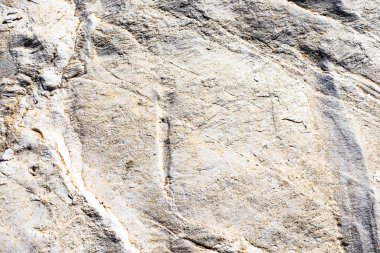 Real natural grunge rusted raw white marble stone surface texture as extracted from the mountain.