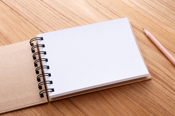 Notebook with pencil