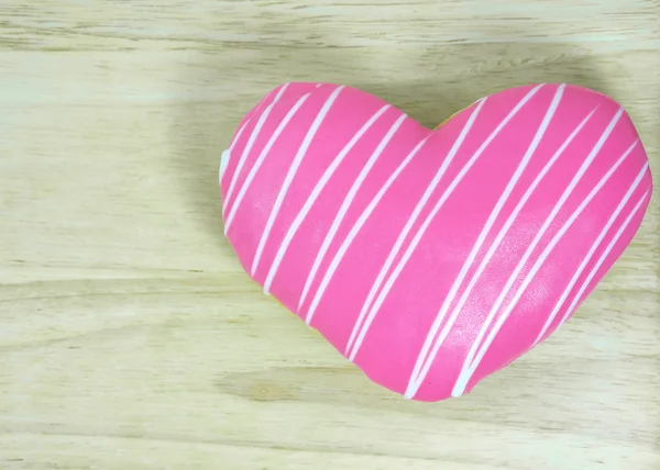 Heart donut on wood table — Stock Photo, Image