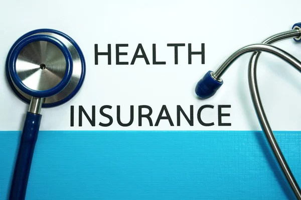 Health insurance with stethoscope — Stock Photo, Image